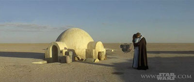 Anakin and Padme embrace on Tatooine in Star Wars: Episode II - Attack of the Clones